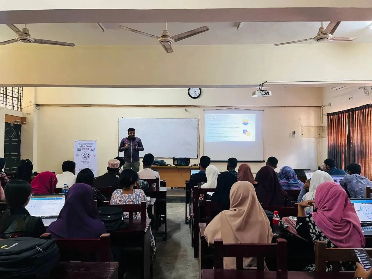 Conducting the Basic Graphic Design Workshop organized by Islamic University Science Club