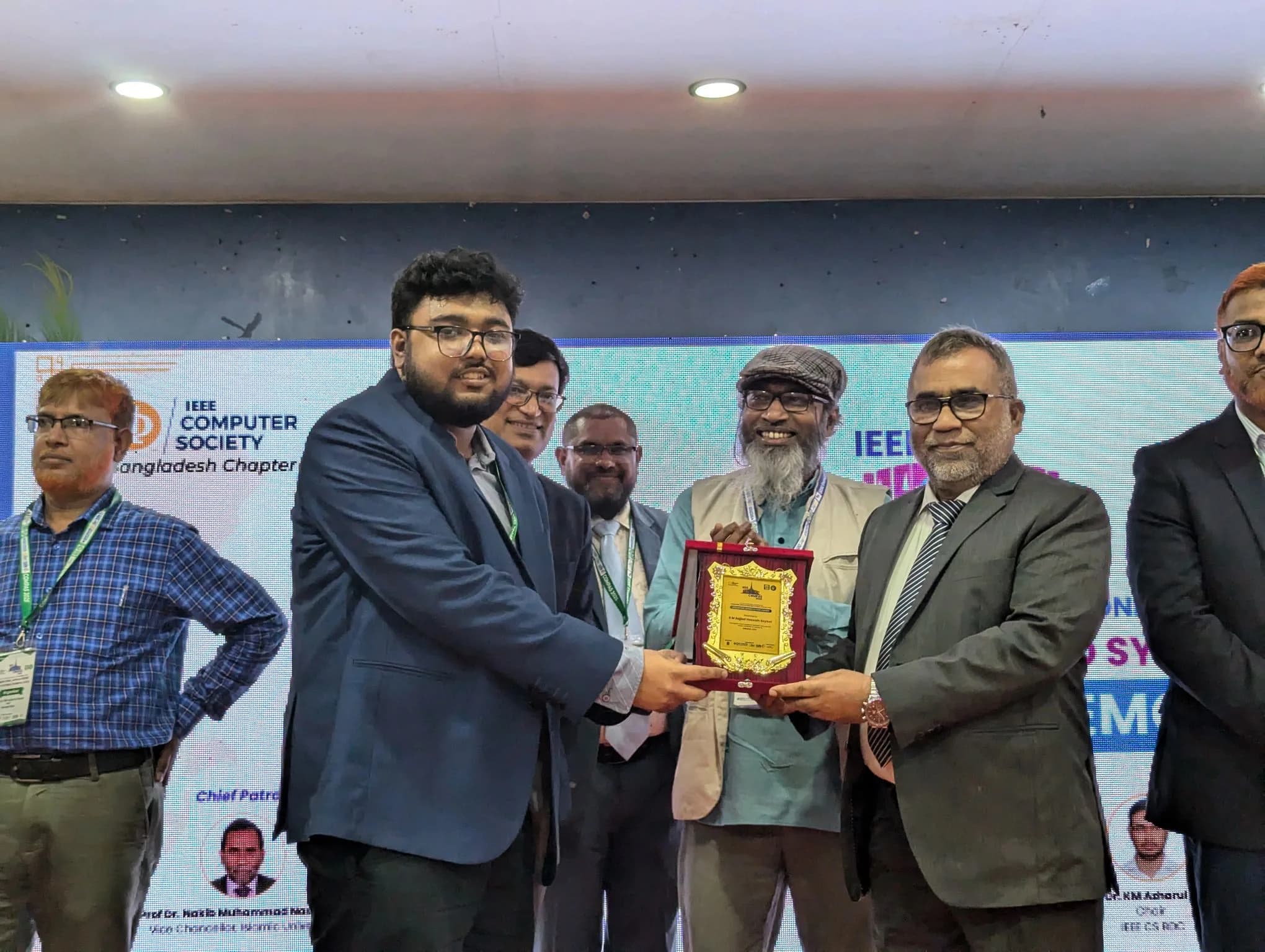 Receiving the Volunteer Appreciation Award at IEEE COMPAS 2025