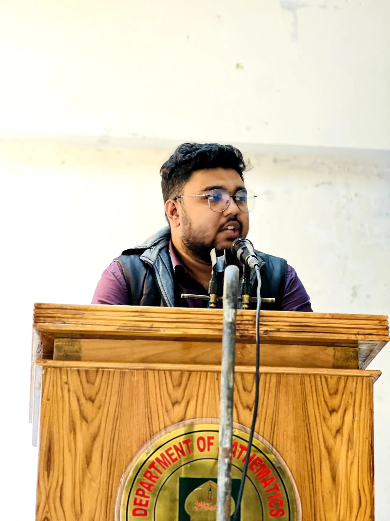 Sajjad delivering speech at IUSC Event